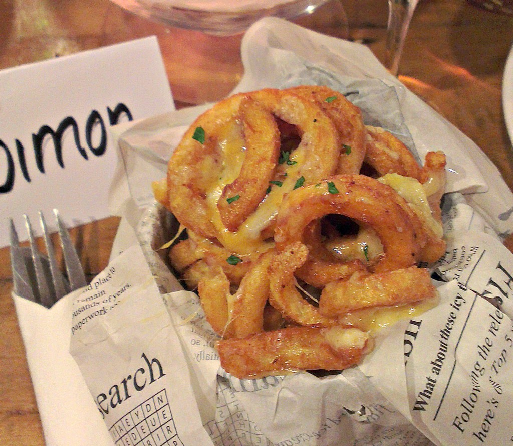 curly fries with cheese at Butters Cafe