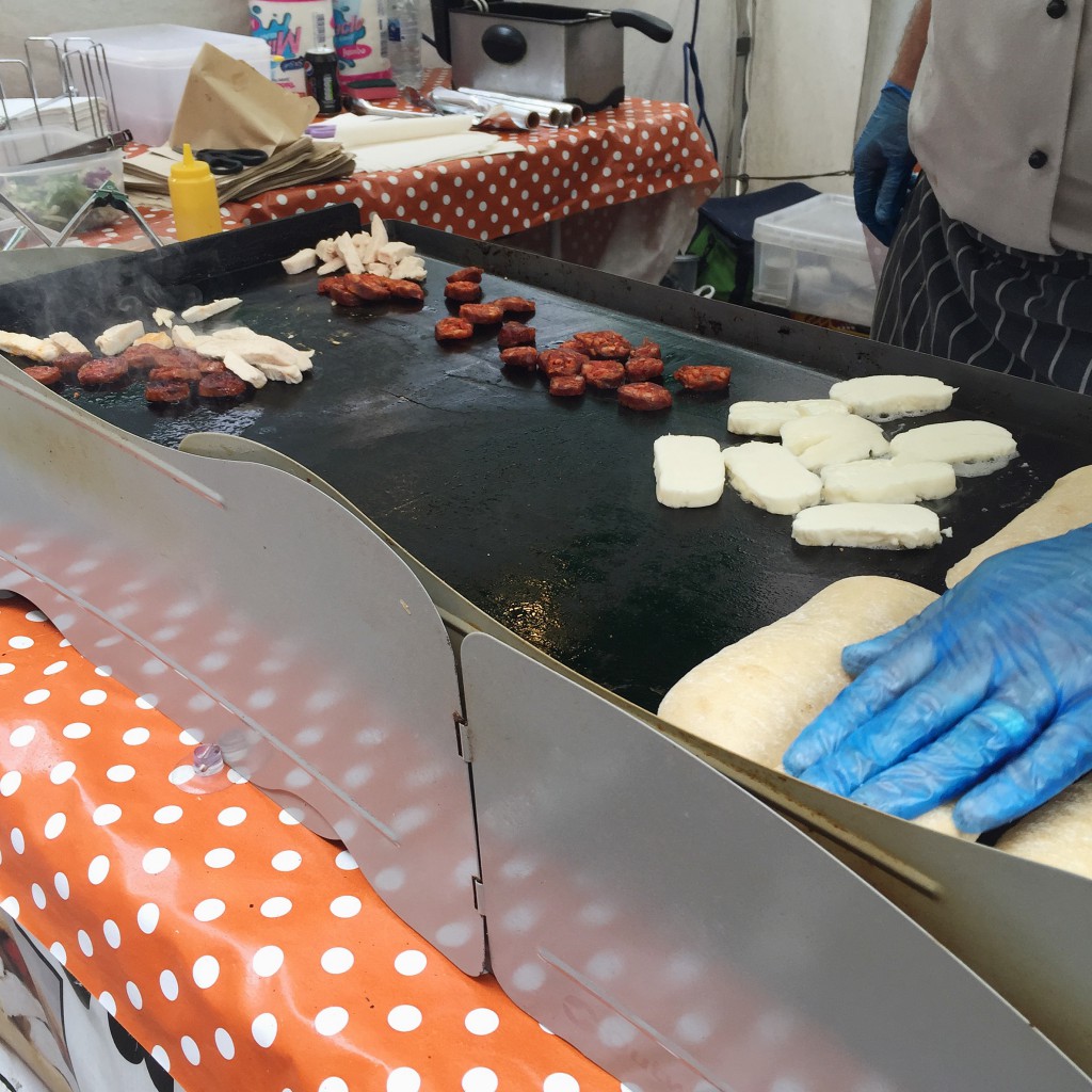 The Ciabatta Man on Winchester Market grilling the meat and cheese