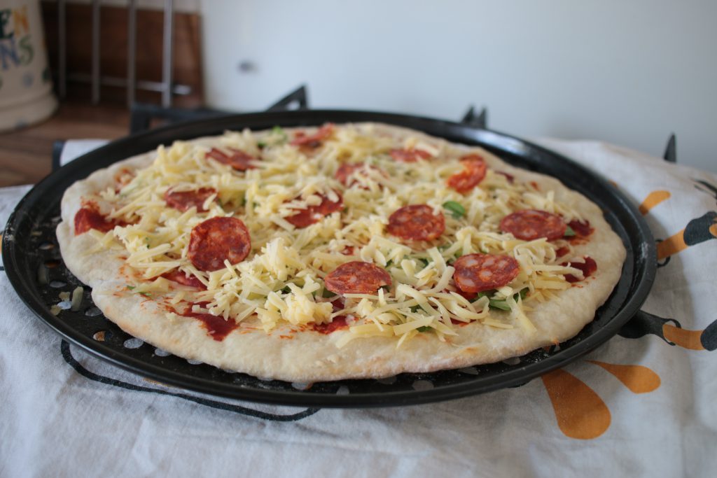 2 ingredient pizza dough ready to go in the oven. 